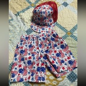 George hat and swim trunks